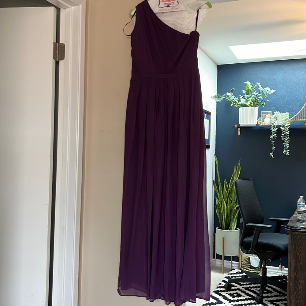 One shoulder purple bridesmaid dress.